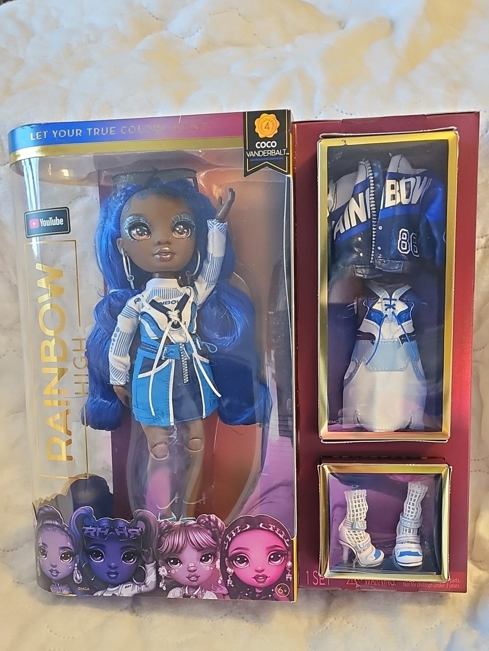 Rainbow Coco Vanderbalt Blue Fashion Doll with Mix-and-Match Blue Outfits